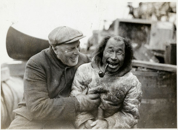 Bob Bartlett and local inhabitant aboard ship during Bartlett's Arctic Expedition, 1933